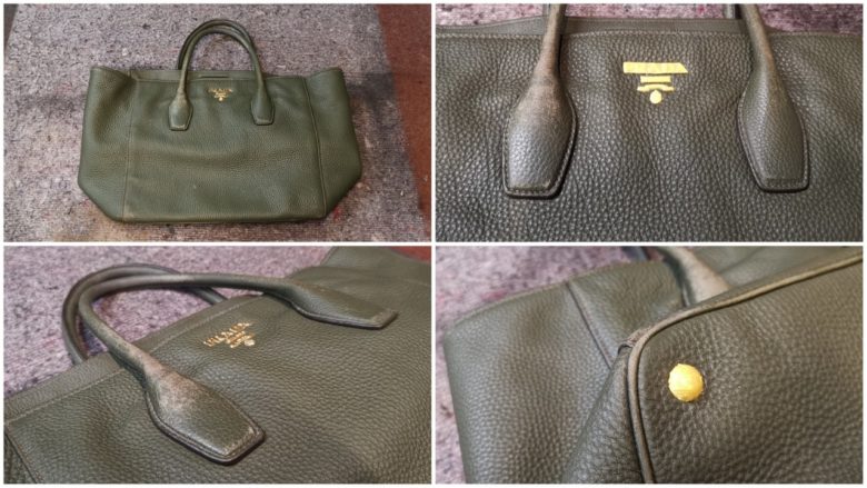 eine Prada Handtasche ist abgenutzt